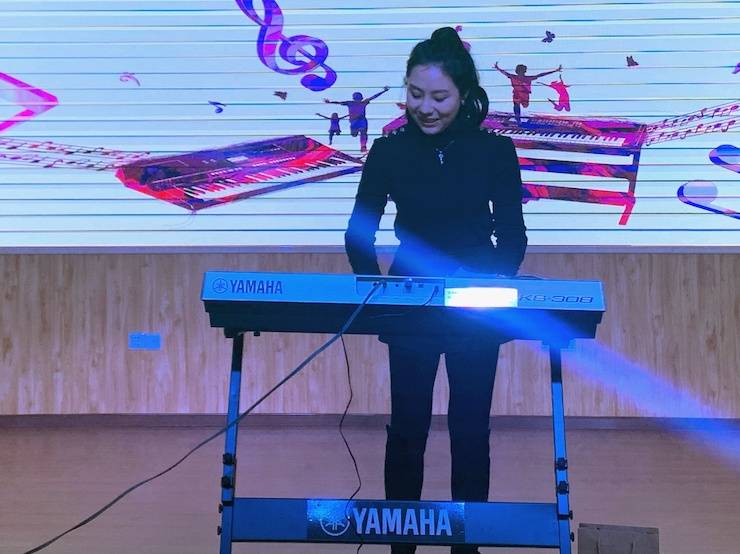 让音乐陪伴成长 BG大游乐器捐赠爱心行动走进重庆市长寿区江南九年制学校